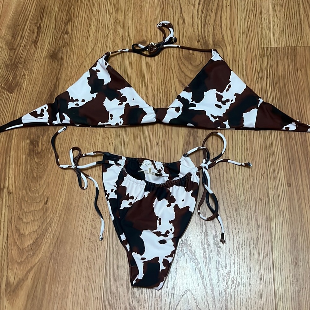 Skatie swim cow print string bikini in Dallas